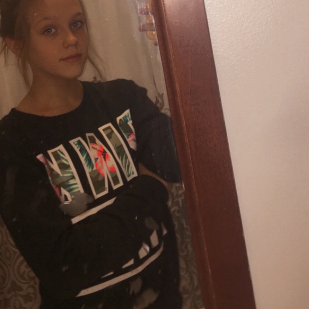 pink victoria secret brand sweatshirt